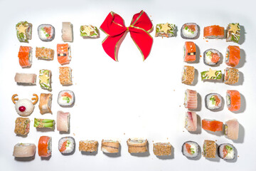 Christmas sushi set with funny decorated rolls like Xmas symbols – santa, deer, snowman, fir tree, Christmas sushi bar menu, festive delivery mock-up