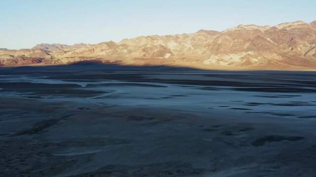 Camera zooming out in an aerial shot of Emigrant Canyan, Devil's Middle Basin and capturing its surreal beauty. 