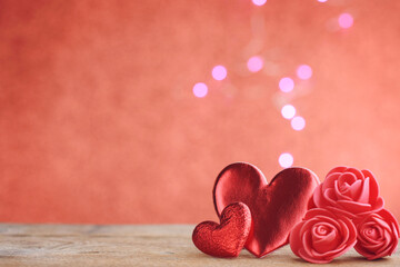 valentine's day, two red hearts, roses on wooden table