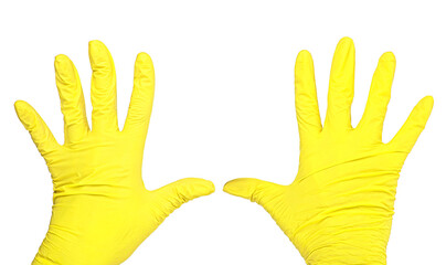 Hands of a medic wearing a latex gloves. Yellow medical gloves. Surgical glove. Covid-19 prevention concept.