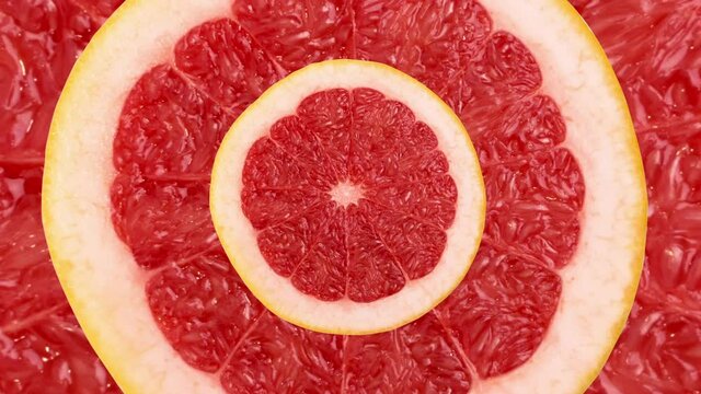 Red grapefruit stop motion animation. Looping animation of round ruby citrus slice, bittersweet fruit