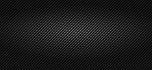 Nice dark carbon fibre background pattern design. Subtle gray lines of strong light weight woven fabric. Bulletproof material