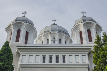 Huge Biserica Buna Vestire Church in Brasov central park. Brasov, Transylvania, Romania.