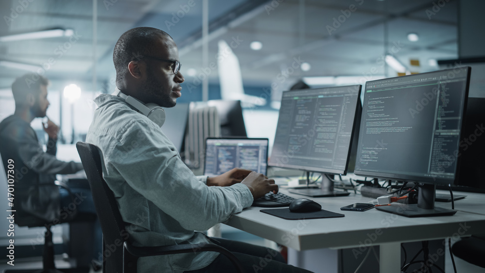 Poster Authentic Office: Enthusiastic Black IT Programmer Starts Working on Desktop Computer. Male Website Developer, Software Engineer Developing App, Video Game. Terminal with Coding Programming Language