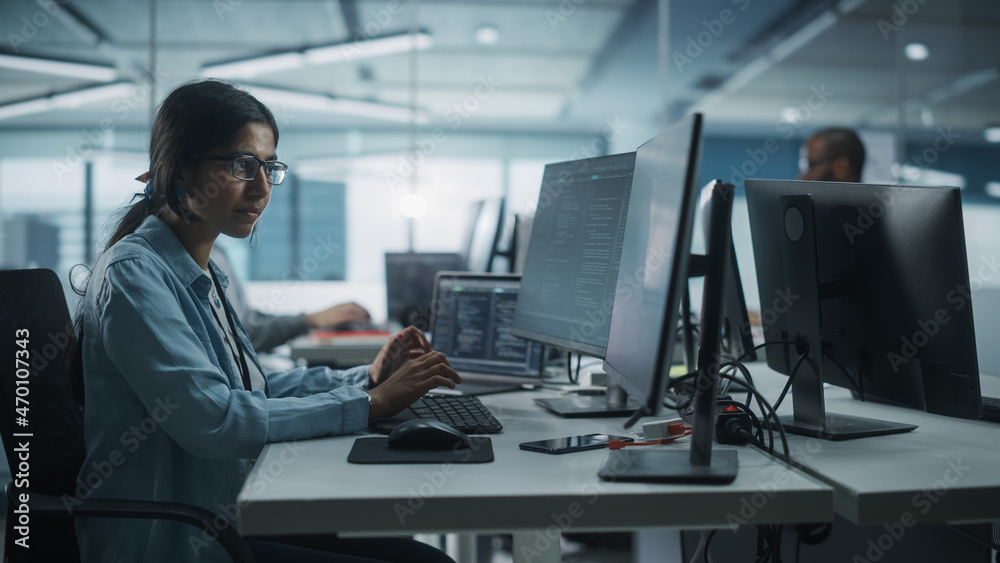 Poster Diverse Office: Indian IT Programmer Working on Desktop Computer. Female Specialist Creating Innovative Software Engineer Developing App, Program, Video Game. Terminal with Coding Language.