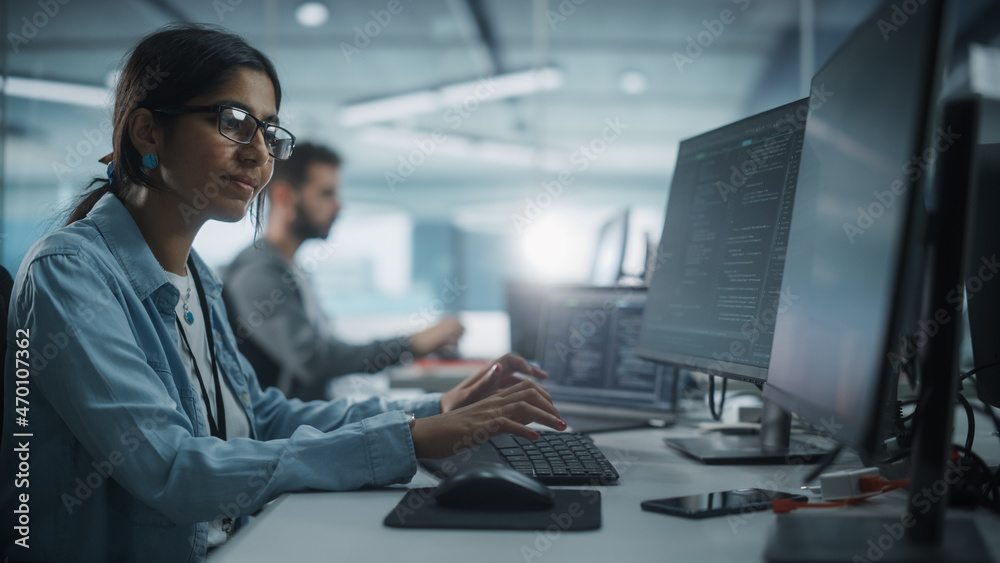 Poster Diverse Office: Indian IT Programmer Working on Desktop Computer. Female Specialist Creating Innovative Software. Engineer Developing App, Program, Video Game. Writing Code in Terminal.