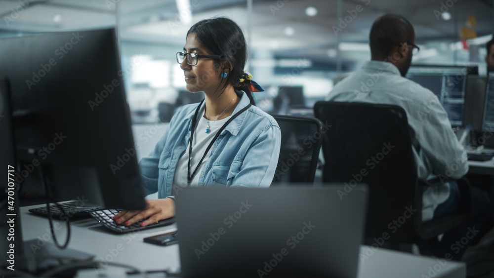Poster diverse office: portrait of talented indian girl it programmer working on desktop computer in friend