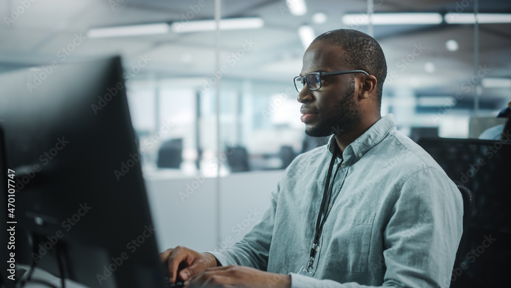 Poster Real Office: Professional Black IT Programmer Working on Desktop Computer. Male Website Developer and Software Engineer Developing App, Video Game. Progressive, Innovative and Inspirational Person