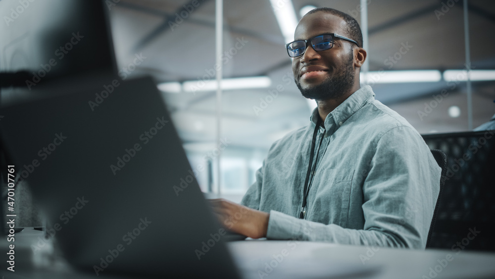Poster Real Office: Professional Black IT Programmer Working on Desktop Computer. Male Website Developer and Software Engineer Developing App, Video Game. Progressive, Innovative and Inspirational Person