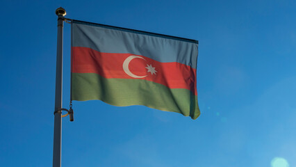 Azerbaijan flag waving on the wind in front of sun. Diplomacy concept. International relations.