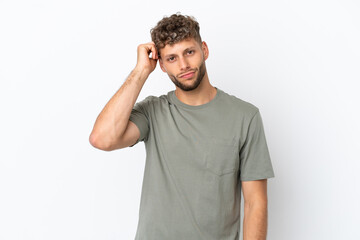 Fototapeta premium Young caucasian handsome man isolated on white background with an expression of frustration and not understanding
