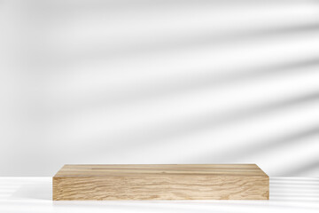 Desk of free space and white wall with shadows 