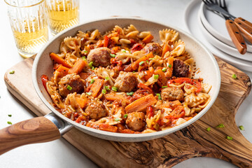 One pan dish. Pasta with onion, red pepper, garlic, tomatoes, carrot and meatballs.