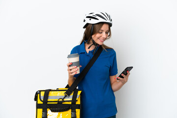 Lithuanian woman with thermal backpack holding coffee to take away and a mobile