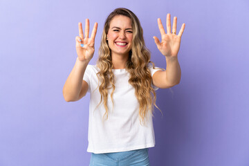 Young Brazilian woman isolated on purple background counting eight with fingers