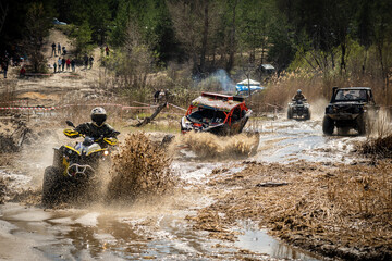 ATV and UTV riders in hard dirt track. Extreme ride. 4x4 © Antonio