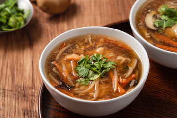 Delicious traditional thick soup with shrimp meat ball and vegetables.