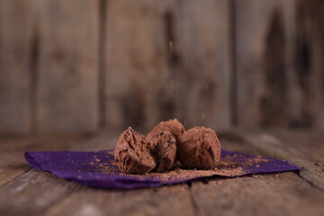 School truffles on wooden background