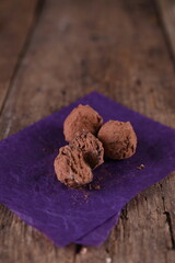 School truffles on wooden background