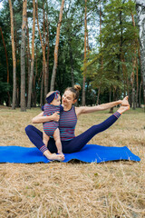 Mommy and Me Yoga for Babies and Postpartum Moms. Zen Family Yoga. Postpartum mother and baby girl...