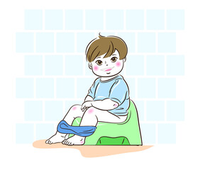 The child is sitting on the potty in the toilet 