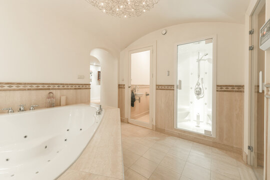 Contemporary bathroom with shower cabin and basin