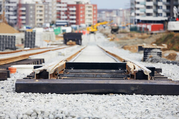 Construction site of railroad track. Building of new tram connection in city.