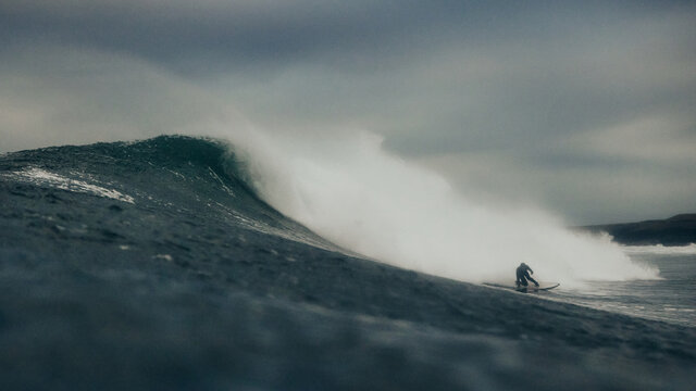 Surfing a big wave in Scotland