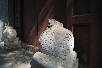Ancient stone lion at the gate, Beijing