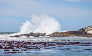 Rocky coastline on Diaz Point with power sea wave - Luederitz, Namibia