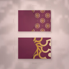 Burgundy abstract gold pattern business card for your brand.