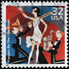 Flappers do the Charleston on american postage stamp