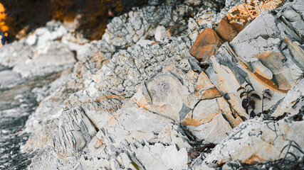 texture of stones and rocks on the lake
