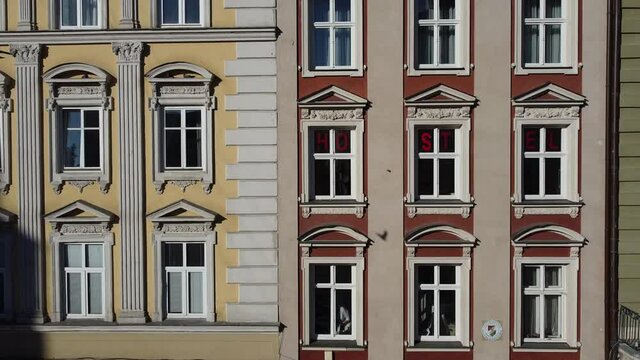 Facade of a European city building. Elements of architecture. Aerial drone view.