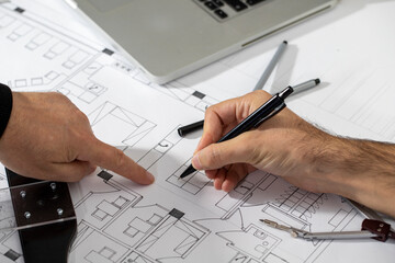 Architect Engineer Design Working on Blueprint Planning Concept. Construction Concept. Selective focus