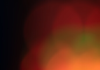 Orange, red, and green light in bottom right corner, fading to black in top left