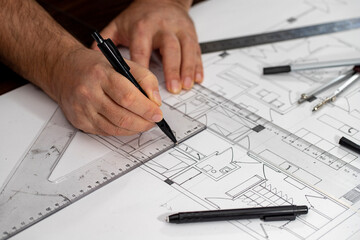 Architect Engineer Design Working on Blueprint Planning Concept. Construction Concept. Selective focus