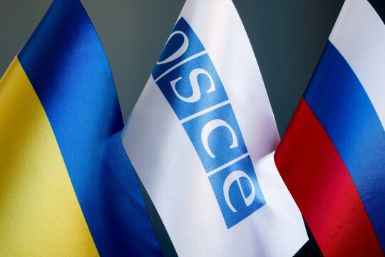 KYIV, UKRAINE - November 17, 2021. Flags of OSCE, Russia and Ukraine.