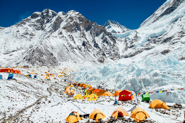 Bright yellow tents in Mount Everest Base Camp, Khumbu glacier and mountains, Sagarmatha national park, Nepal, Himalayas - obrazy, fototapety, plakaty