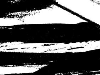 Grunge is black and white. Texture of black strokes on a white background. Abstract chaotic movements with a dry brush. Monochrome pattern of worn surface