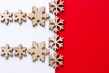 christmas star/snowflake decorations on red and white paper