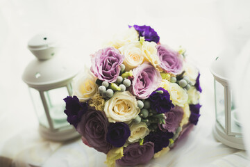 Beautiful wedding bouquet with different flowers, roses