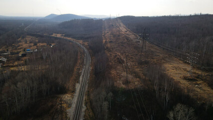 Naklejka premium Aerial view of the Railroad Bend and Highway, Mountain Ridge, Lap in Autumn