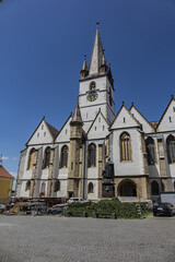 Fototapeta na wymiar Gothic-style Saint Mary Lutheran Cathedral (Evangelische Stadtpfarrkirche in Hermannstadt, 14th century) in Sibiu city, Transylvania, Romania.
