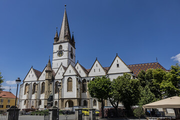 Fototapeta na wymiar Gothic-style Saint Mary Lutheran Cathedral (Evangelische Stadtpfarrkirche in Hermannstadt, 14th century) in Sibiu city, Transylvania, Romania.