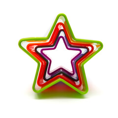 Set of colored shapes in the form of stars for Christmas cookies on a white background. Isolated