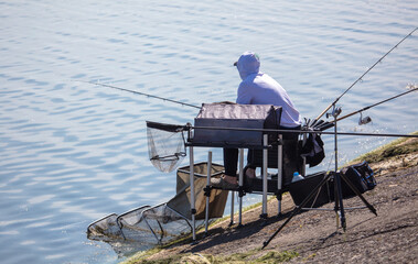 A man fishing with a rod