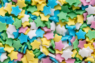 Colorful Sugar Star Sprinkles Background.
