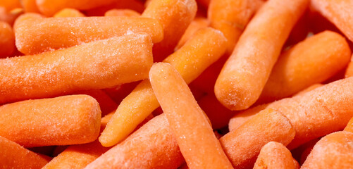Heap of frozen baby carrot. Food background - 470147946
