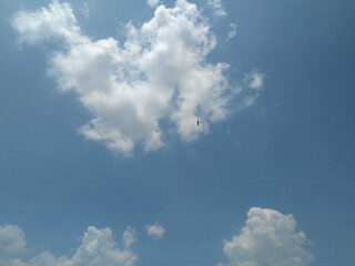Cumulus white clouds in sky background, nature photography, beautiful day weather conditions, outdoor scenery view